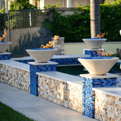 The Outdoor Plus Cazo Fire Bowl in the Pool Area Zoom View