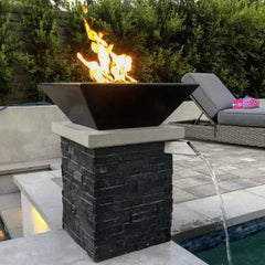 The Outdoor Plus Maya Fire Bowl Powder Coated White Finish Set in the Side of Pool Area