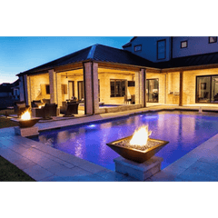 The Outdoor Plus Maya Fire Bowl Powder Coated White Finish in the Pool Area Night View