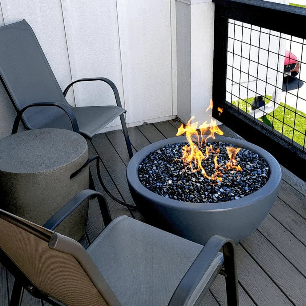 The Outdoor Plus Luna Concrete Round Fire Bowl in the Balcony