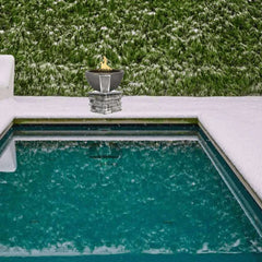 The Outdoor Plus Luna Fire and Water Bowl in the Pool Area