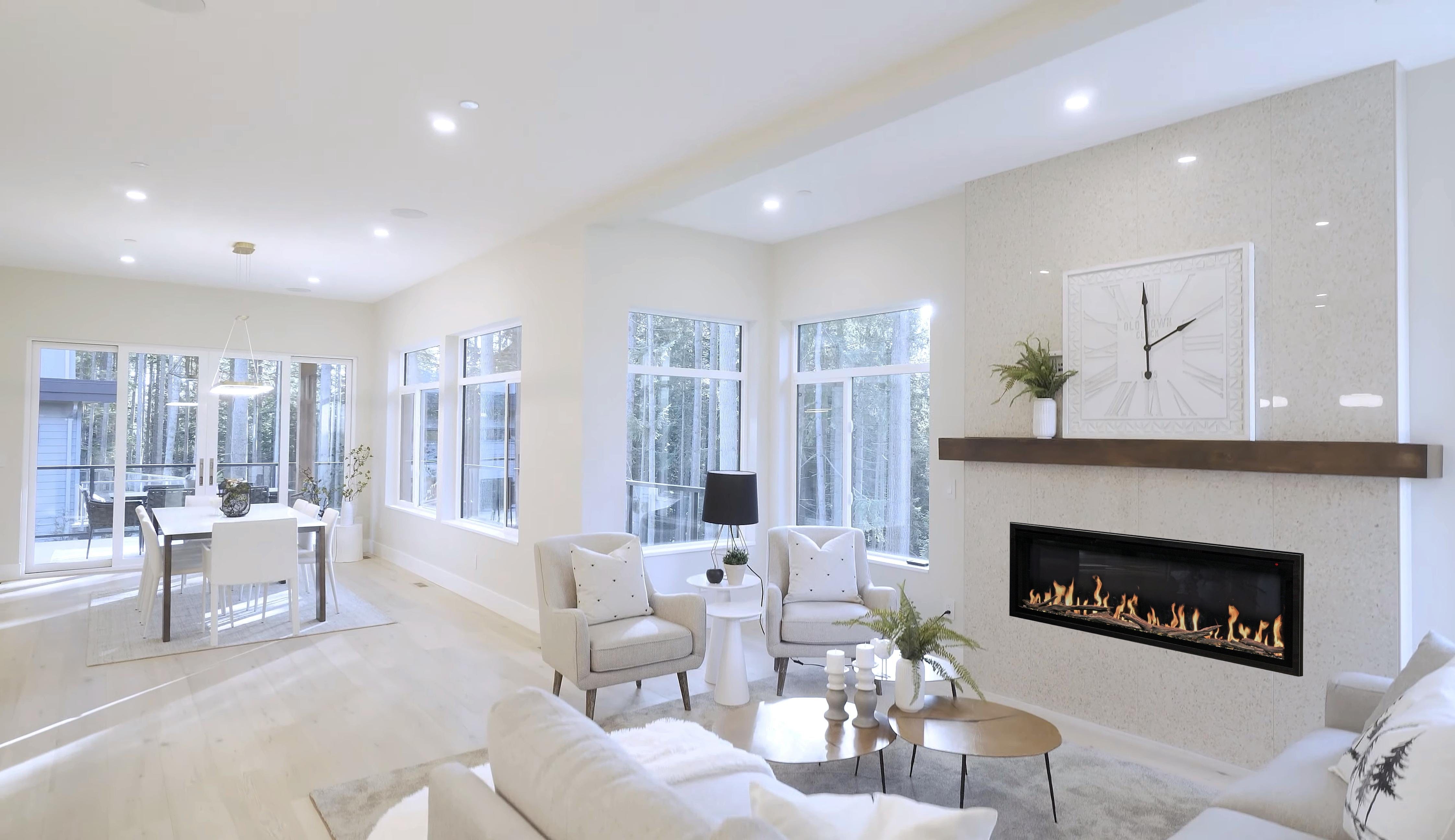 Modern Flames Orion Slim Fireplace with Living Area View and Dining on Right