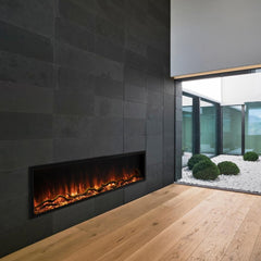 Modern Flames Built In Electric Fireplace and Light Red Flames with Matte Black Finish Wall and Backyard on Right