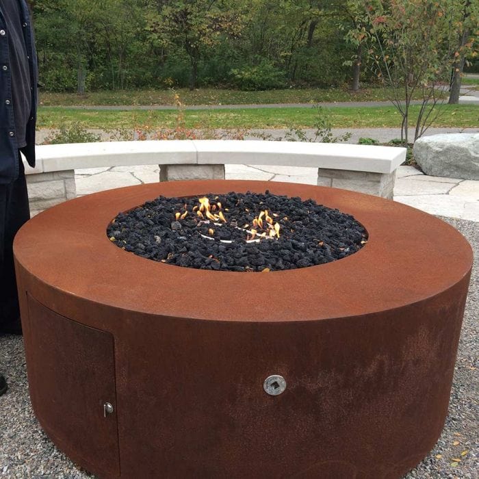 The Outdoor Plus 24-inch Tall Unity shown corten steel look after a year