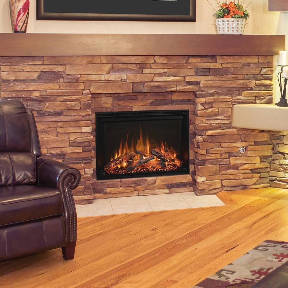 Mdern Flames Redstone Traditional Built-In Electric Fireplace install in the Living Area with Chair on Right